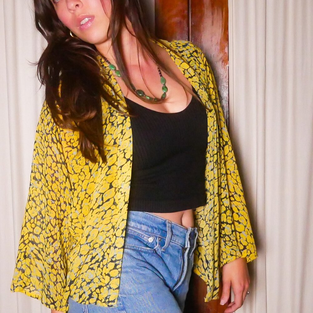 Yellow with black and blue spots Duster